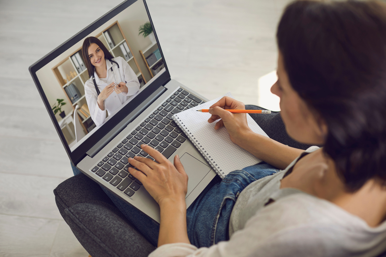 Online Medical Consultation. the Patient Consults with the Doctor Using the Video Conference Application of the Medical Clinic Remotely. Virtual Clinic Concept.